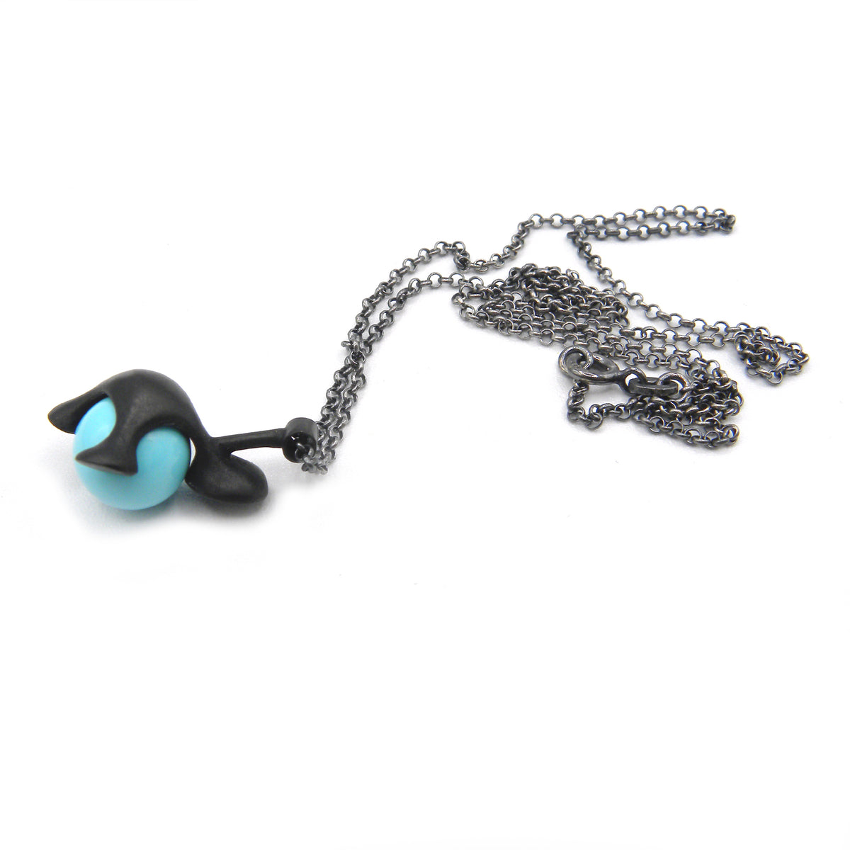 Turquoise Snorky pendant with black patina
