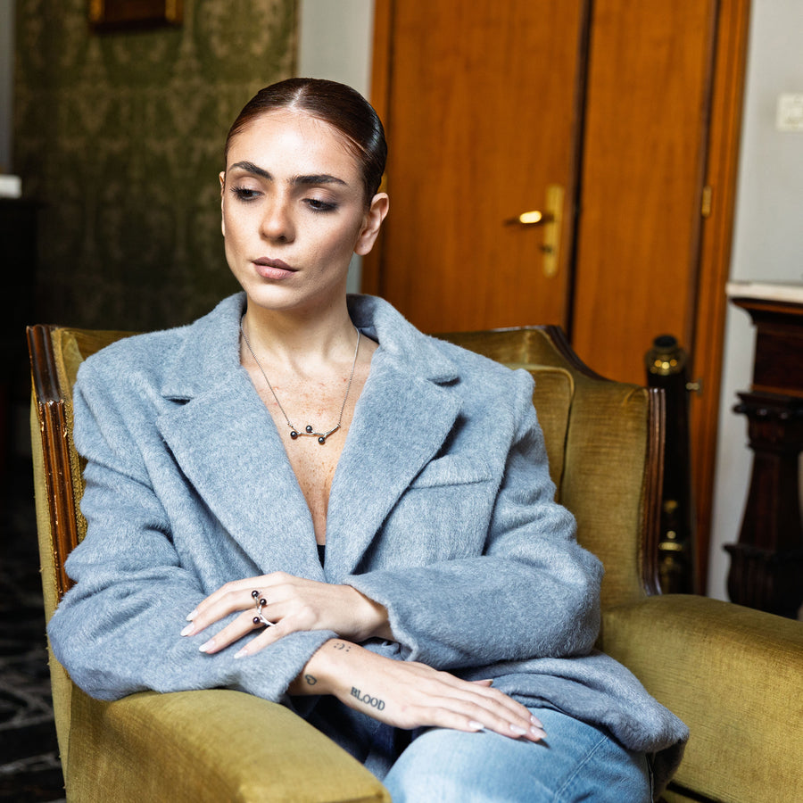Ring with twig and grey pearls